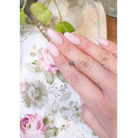 0.55 Ct. Bluish Green Sapphire from Madagascar Life Style