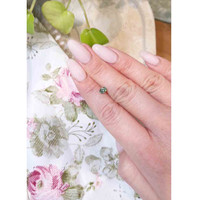 0.58 Ct. Bluish Green Sapphire from Madagascar Life Style