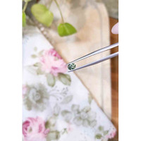 0.58 Ct. Bluish Green Sapphire from Madagascar Life Style