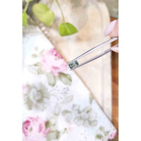 0.88 Ct. Yellowish Green Sapphire from Madagascar Life Style