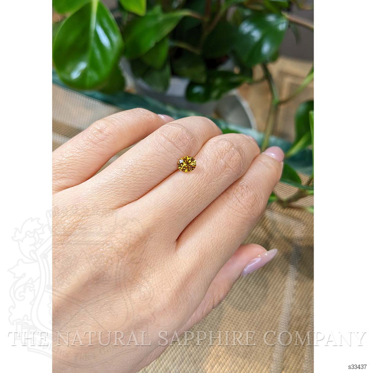 0.89 Ct. Orangish Yellow Sapphire from Montana