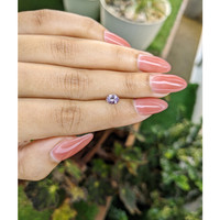 0.46 Ct. Pinkish Purple Sapphire from Ceylon (Sri Lanka) Life Style