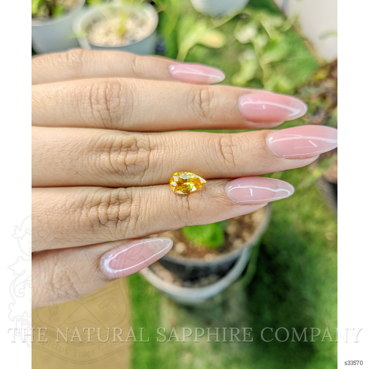 2.05 Ct. Orangish Yellow Sapphire from Ceylon (Sri Lanka)