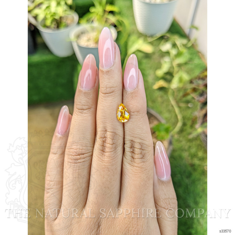 2.05 Ct. Orangish Yellow Sapphire from Ceylon (Sri Lanka)