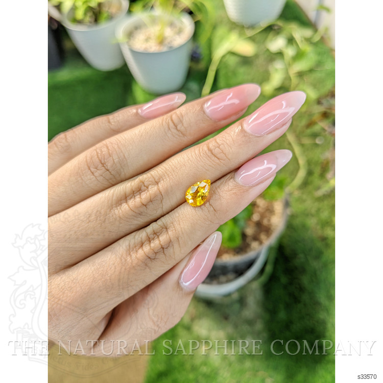 2.05 Ct. Orangish Yellow Sapphire from Ceylon (Sri Lanka)