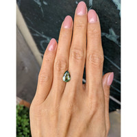 2.61 Ct. Yellowish Green Sapphire from Madagascar Life Style