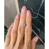 1.57 Ct. Yellowish Green Sapphire from Madagascar Life Style