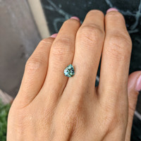 1.57 Ct. Yellowish Green Sapphire from Madagascar Life Style