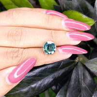 4.03 Ct. Bluish Green Sapphire from Madagascar Life Style