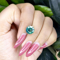 4.03 Ct. Bluish Green Sapphire from Madagascar Life Style