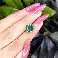4.03 Ct. Bluish Green Sapphire from Madagascar Life Style