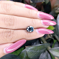 2.20 Ct. Greenish Blue Sapphire from Madagascar Life Style