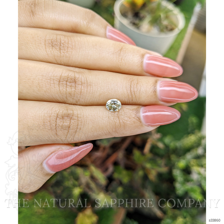 0.78 Ct. Greenish Yellow Sapphire from Ceylon (Sri Lanka)