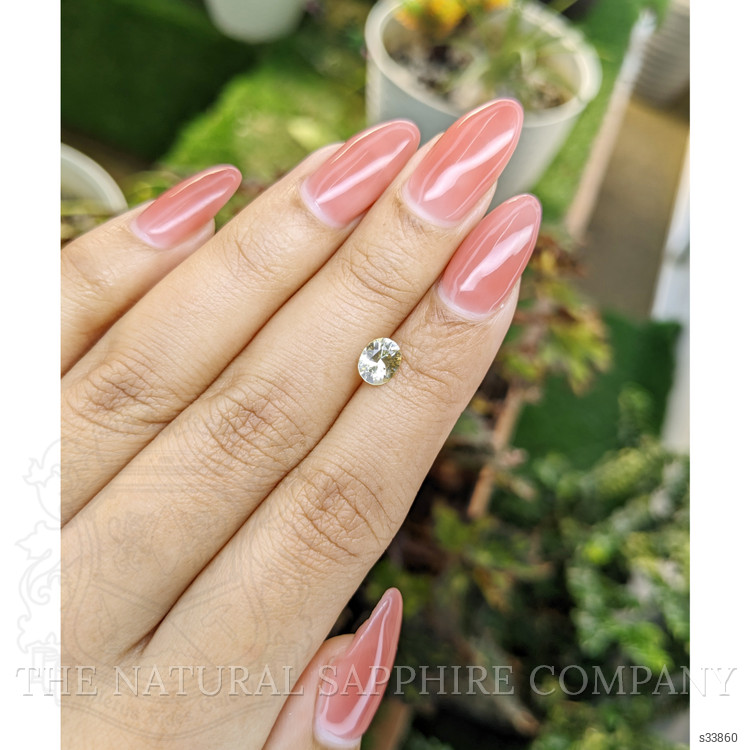 0.78 Ct. Greenish Yellow Sapphire from Ceylon (Sri Lanka)