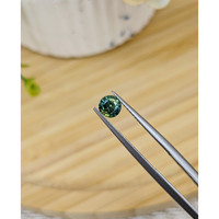 0.74 Ct. Yellowish Green Sapphire from Madagascar Life Style