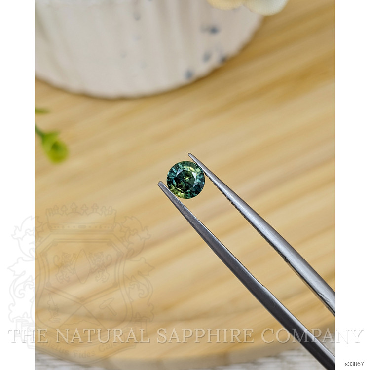 0.74 Ct. Yellowish Green Sapphire from Madagascar