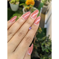 0.52 Ct. Pinkish Purple Sapphire from Madagascar Life Style