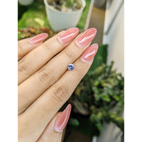 0.55 Ct. Violet Sapphire from Madagascar Life Style