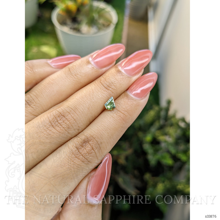 0.66 Ct. Yellowish Green Sapphire from Madagascar