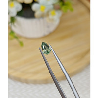 0.72 Ct. Yellowish Green Sapphire from Madagascar Life Style