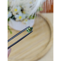0.68 Ct. Yellowish Green Sapphire from Madagascar Life Style