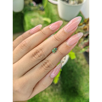 0.68 Ct. Yellowish Green Sapphire from Madagascar Life Style