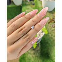 0.64 Ct. Peach Sapphire from Madagascar Life Style