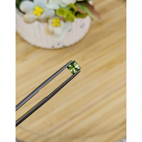 0.56 Ct. Yellowish Green Sapphire from Madagascar Life Style