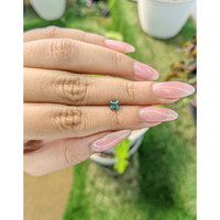 0.68 Ct. Bluish Green Sapphire from Madagascar Life Style