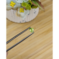 0.57 Ct. Yellowish Green Sapphire from Madagascar Life Style