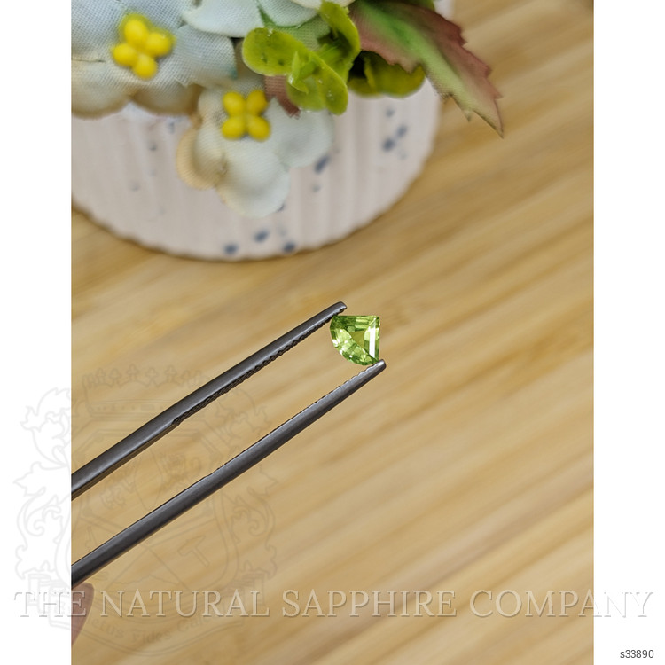 0.57 Ct. Yellowish Green Sapphire from Madagascar