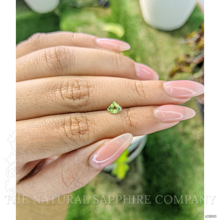 0.57 Ct. Yellowish Green Sapphire from Madagascar