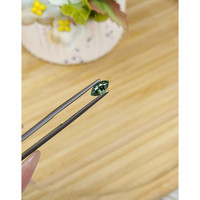 0.79 Ct. Bluish Green Sapphire from Madagascar Life Style