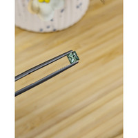 0.45 Ct. Green Sapphire from Madagascar Life Style
