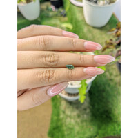 0.90 Ct. Green Sapphire from Madagascar Life Style