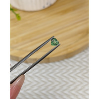 0.60 Ct. Green Sapphire from Madagascar Life Style