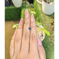 1.01 Ct. Greenish Blue Sapphire from Madagascar Life Style