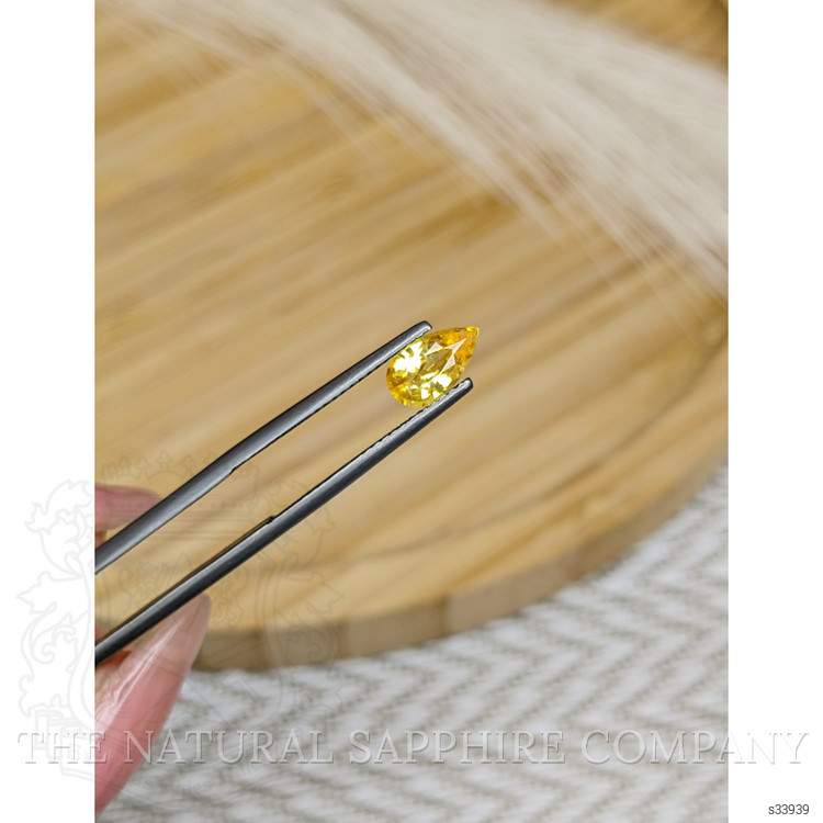 1.06 Ct. Orangish Yellow Sapphire from Ceylon (Sri Lanka)