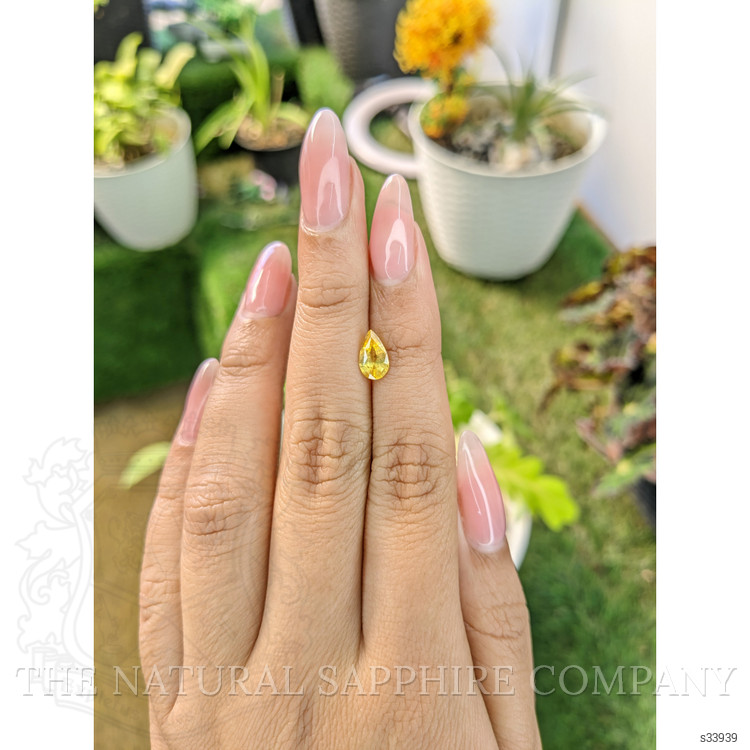 1.06 Ct. Orangish Yellow Sapphire from Ceylon (Sri Lanka)