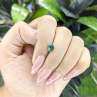 0.85 Ct. Bluish Green Sapphire from Madagascar Life Style