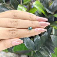 0.85 Ct. Bluish Green Sapphire from Madagascar Life Style