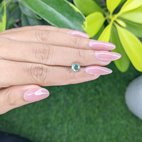 1.08 Ct. Bluish Green Sapphire from Madagascar Life Style