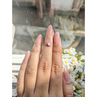 0.71 Ct. Purplish Pink Star Sapphire from Ceylon (Sri Lanka) Life Style