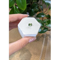 1.57 Ct. Yellowish Green Sapphire from Madagascar Life Style