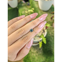 0.81 Ct. Greenish Blue Sapphire from Madagascar Life Style