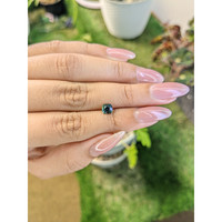 0.76 Ct. Bluish Green Sapphire from Madagascar Life Style