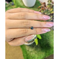 0.81 Ct. Greenish Blue Sapphire from Madagascar Life Style