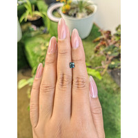 0.72 Ct. Bluish Green Sapphire from Madagascar Life Style