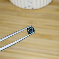 0.72 Ct. Bluish Green Sapphire from Madagascar Life Style