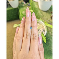 0.72 Ct. Bluish Green Sapphire from Madagascar Life Style